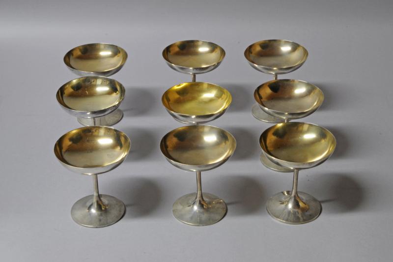 Set of nine silver Edwardian champagne cups, gilt interior, by Elkington & Co, hallmarked Birmingham