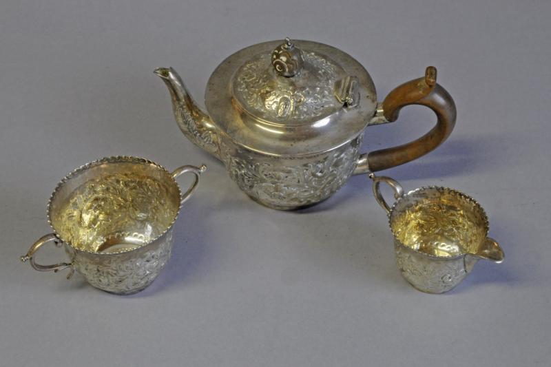 Victorian silver tea service; tea pot, sugar bown and milk jug, by Miller Wilkinson, hallmarked