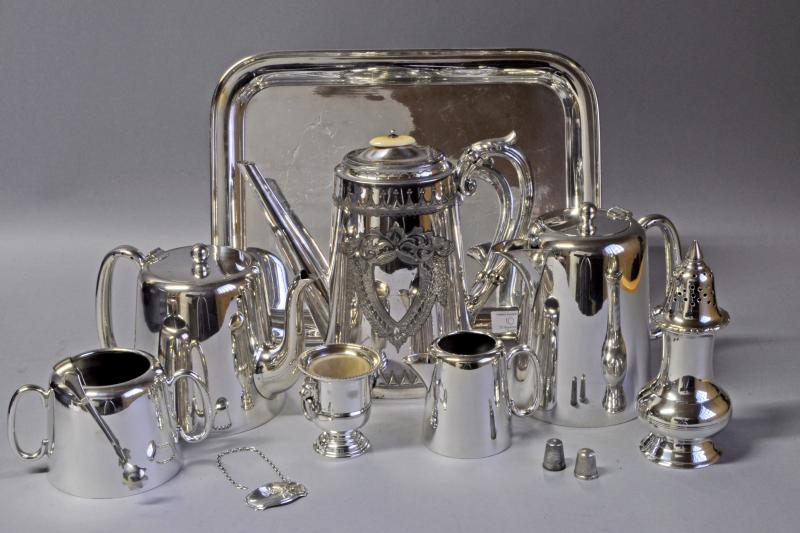 Quantity of silver plated items including jugs, tea pots and sugar tongs, together with a sterling