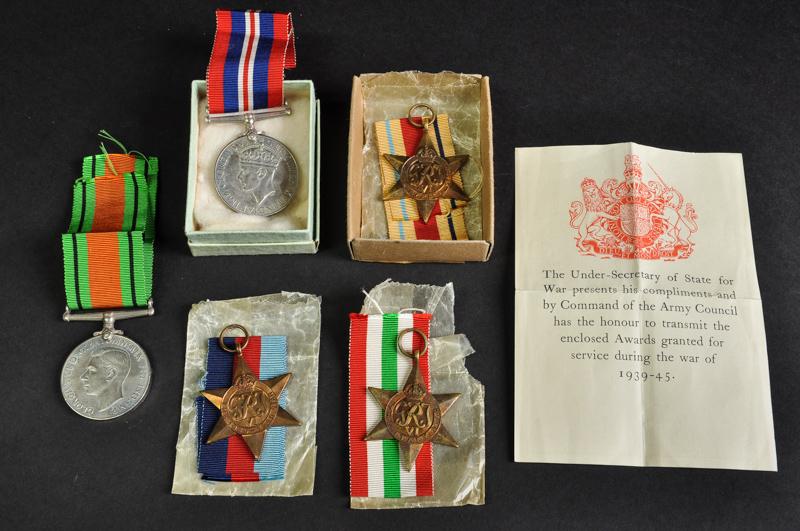 World War II, an un-attributed group of five metals, 1939-45, Africa and Italy stars, Defence and