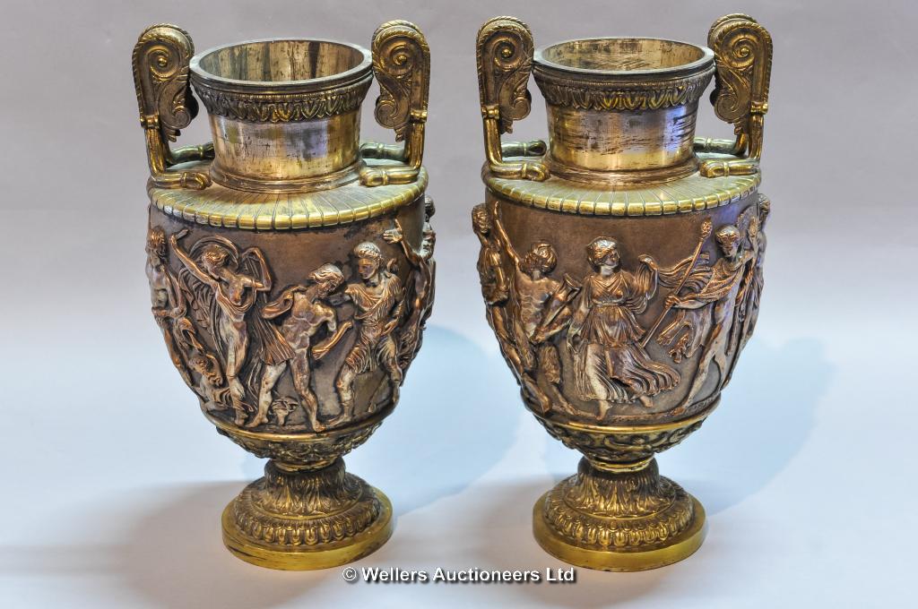 Pair of copper and brass classical style urns (39cms tall)