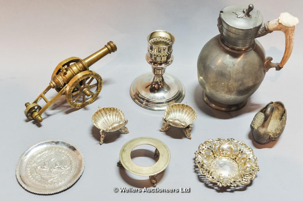 A collection of metal, including silver plate, pewter and brass