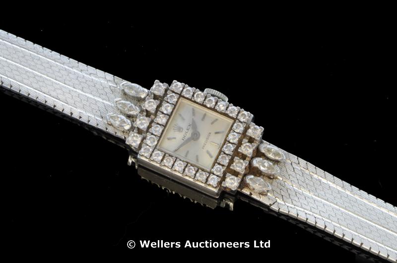 Ladies` vintage Rolex diamond set cocktail watch, square silvered Rolex dial with a border of