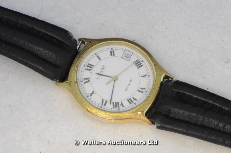 *Gentlemen`s Tissot wristwatch, white dial with Roman numerals and date aperture, on a black leather