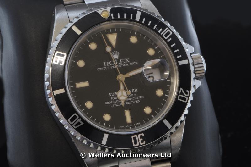 Gentlemen`s Rolex Submariner, black dial and bezel, stainless steel case and bracelet, model