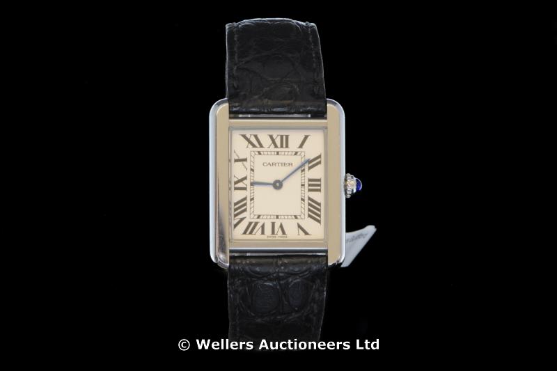 *Ladies` Cartier wristwatch on a black leather strap (Lot subject to VAT)