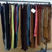55 x Items Of Assorted Women and Girls Clothing - Includes a Great Selection of Pants, Skirts and