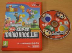 1 x Nintendo Wii Game - NEW SUPER MARIO BROS - Includes Two Steering Wheels - Good Condition - Boxed
