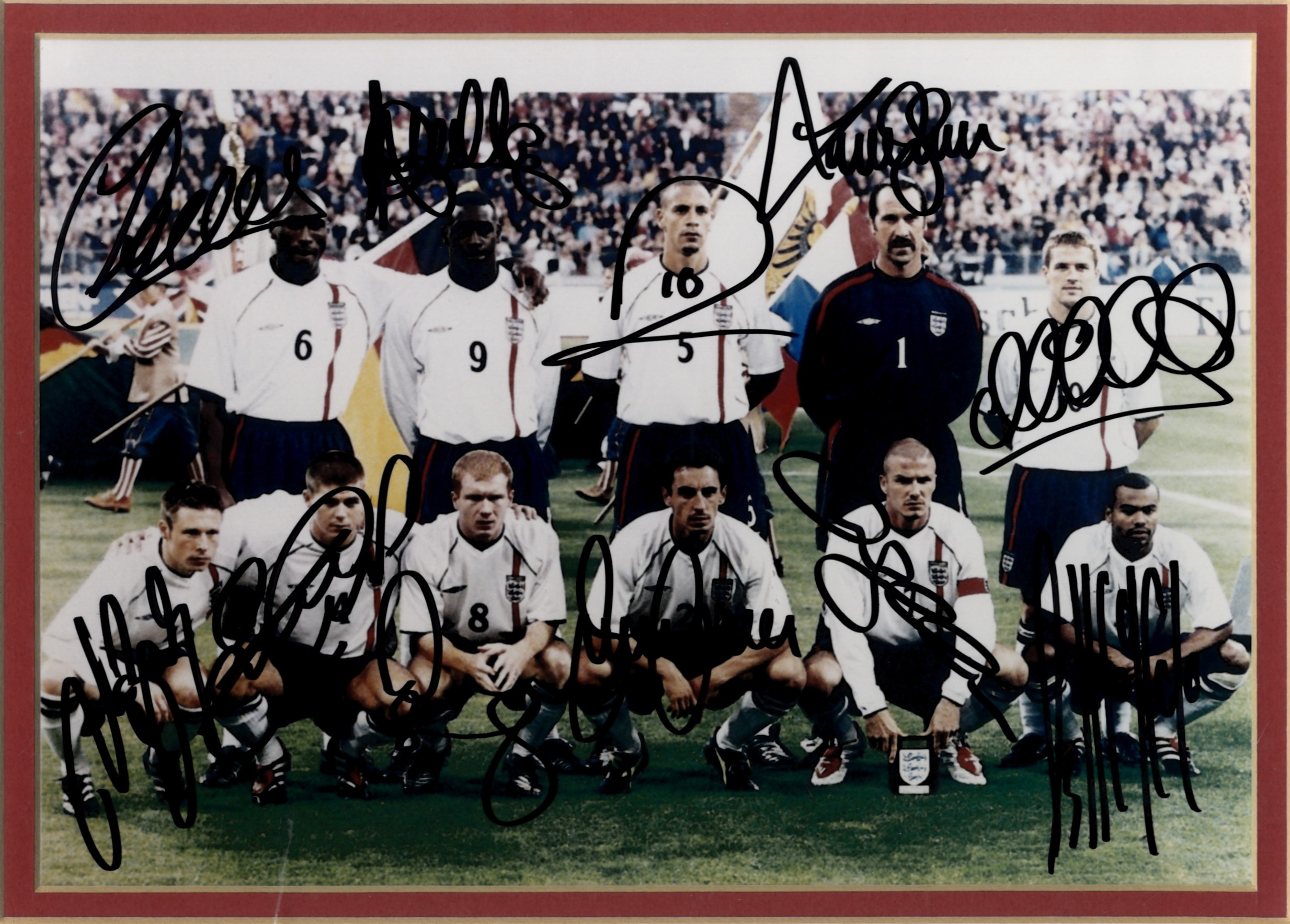 ENGLAND FOOTBALL: A good signed colour 10 x 8 photograph by all eleven members of the England