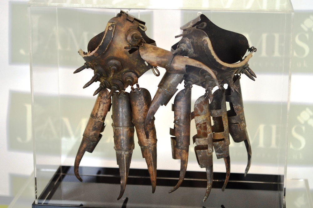 A pair of original hand made metal spiked Japanese fighting gloves! comes in a display case A pair