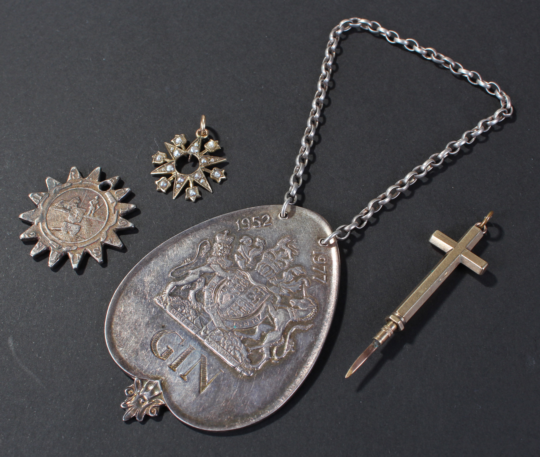 Mixed lot of Silver and Yellow Metal to include, Silver Hallmarked Gin Bottle Label, Cross shaped