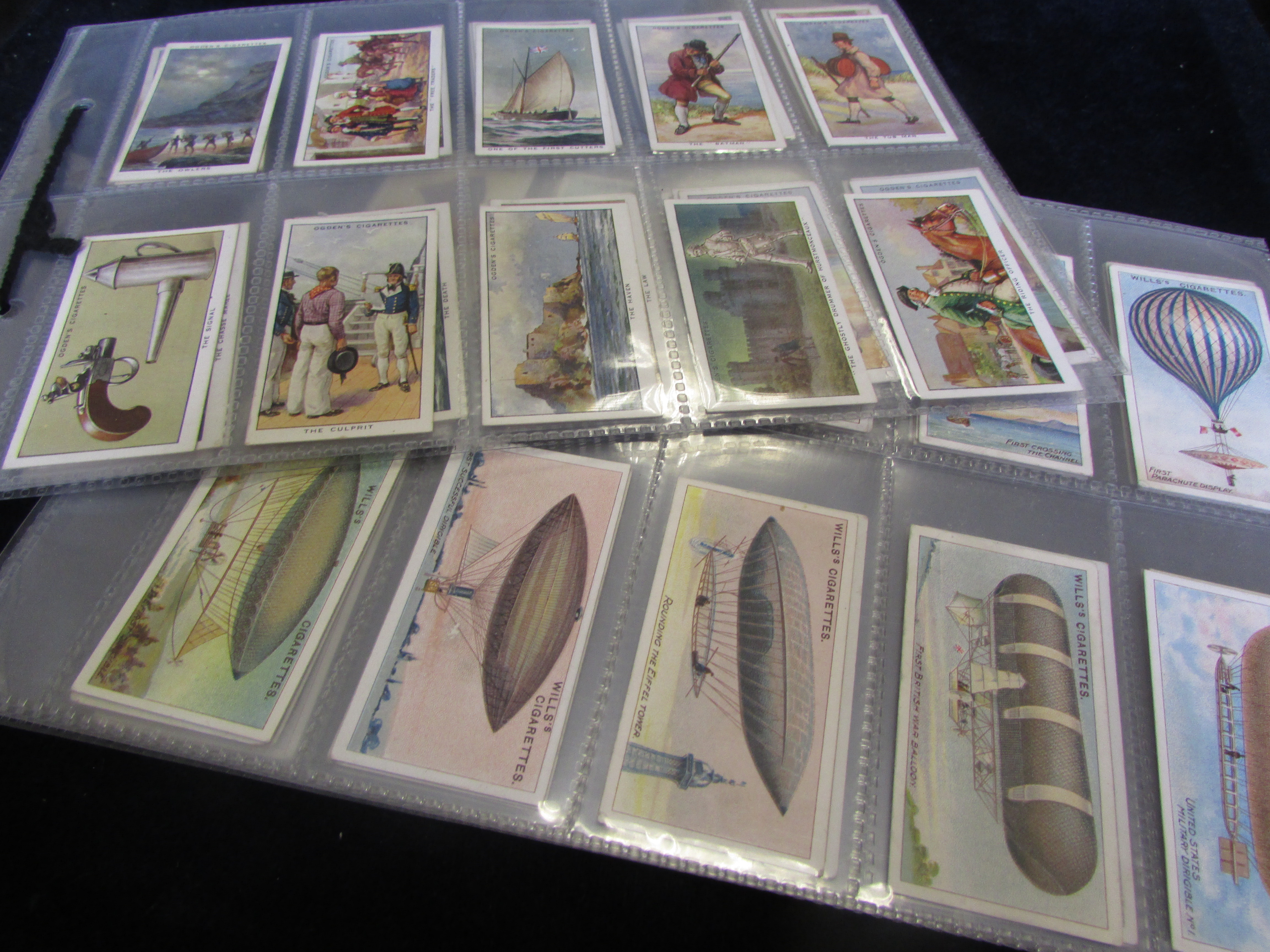 Ogdens Smugglers and Smuggling set 1932, and Wills Aviation set 1910, total cat £250 G-VG (2)