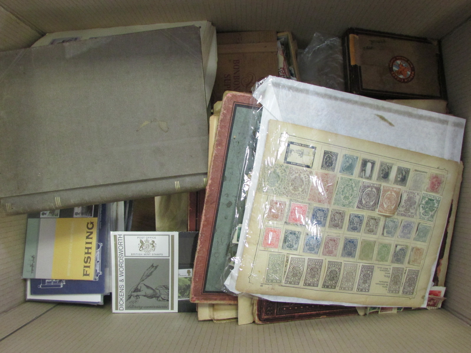 Large old time World lot of material in albums, loose, on leaves, etc. Well worth a look, early