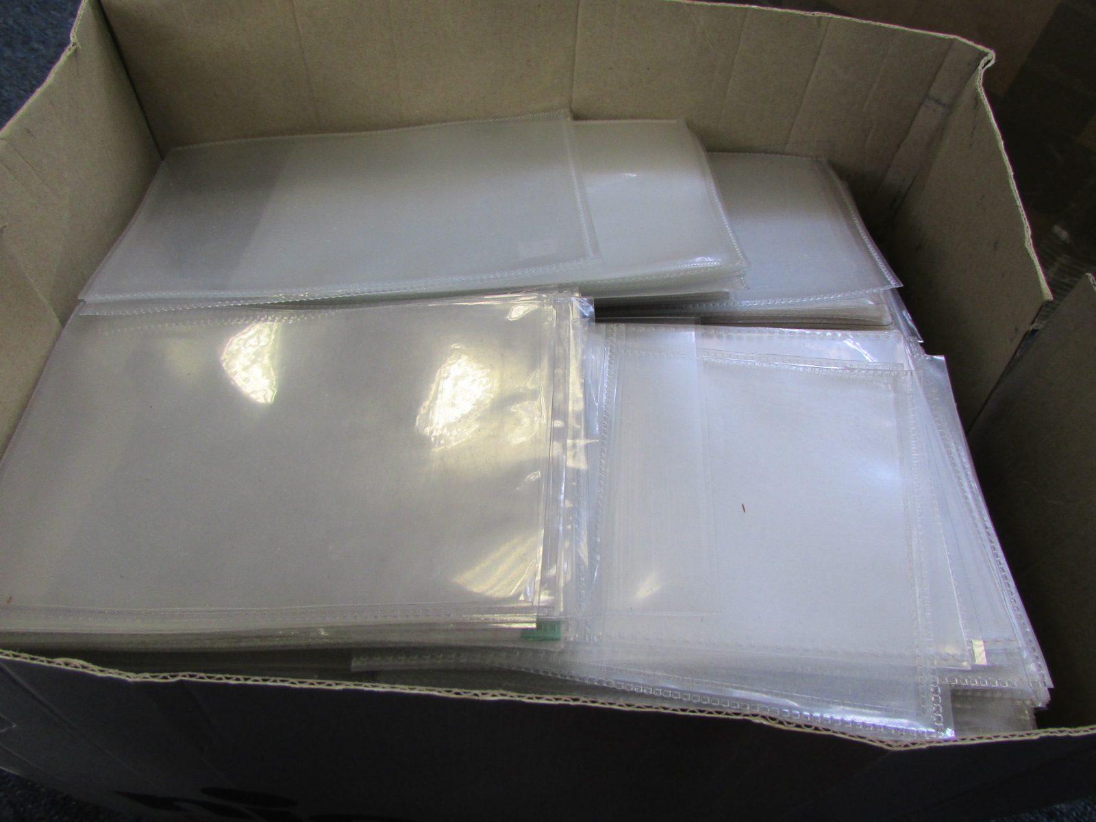 Accessories - box of standard size postcard sleeves, mostly as new (approx 2,400) Buyer collects