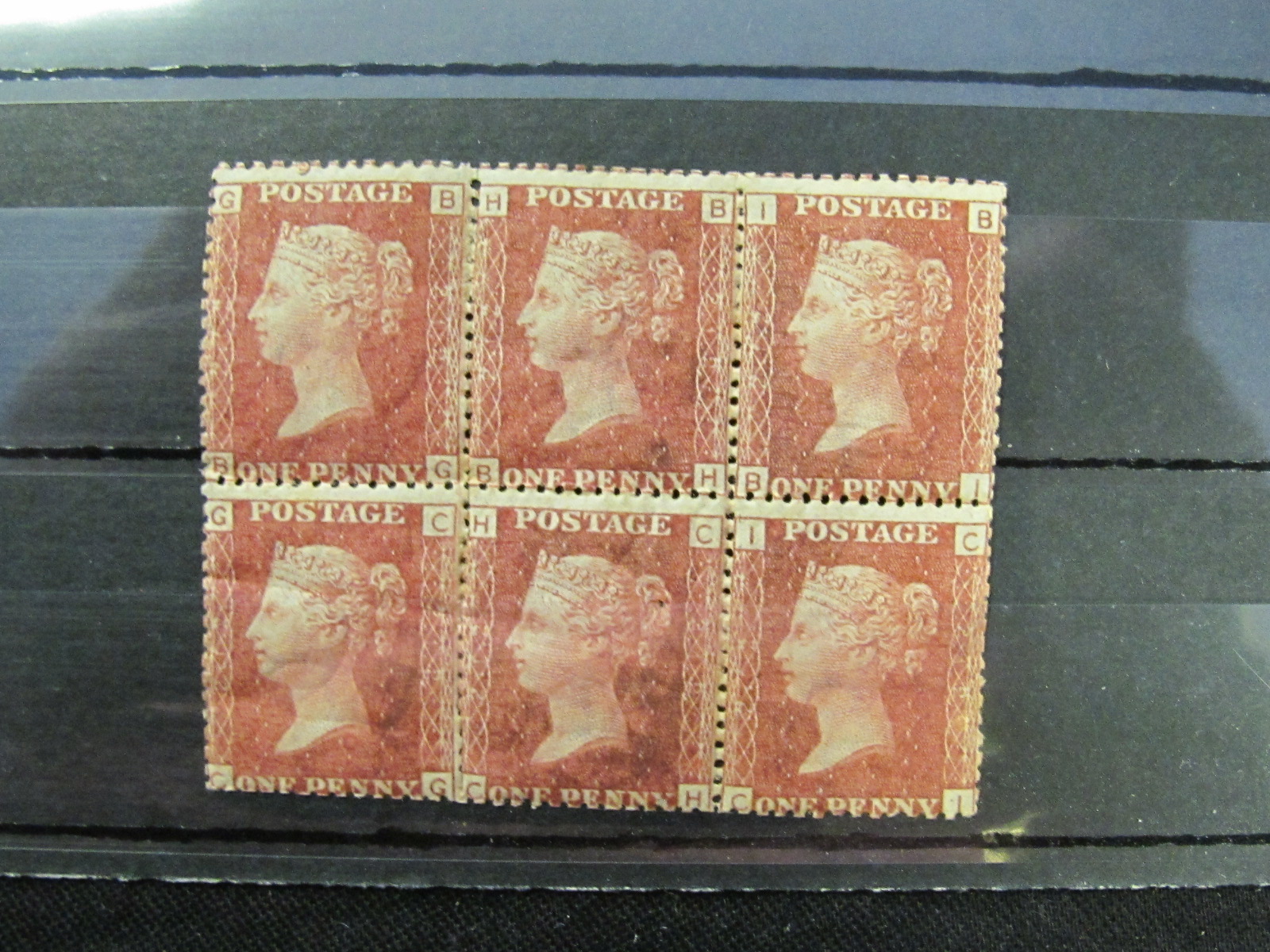 GB - QV Penny Red block of six, plate 212, top middle stamp MM, rest UM, bottom middle small pin