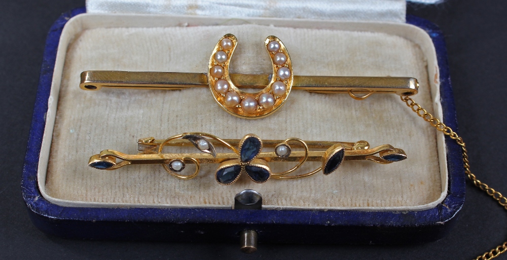9 carat gold floral bar brooch, set with blue sapphires and pearls, together with, one other 9 carat