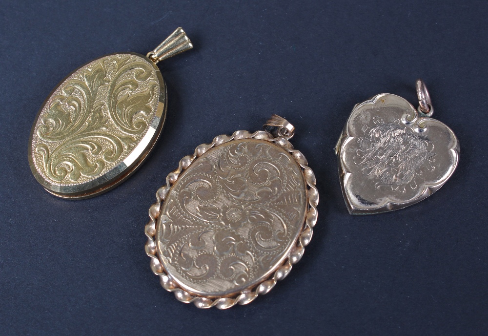 Two 9 carat gold foliate engraved lockets, together with, heart shaped gold locket, total weight