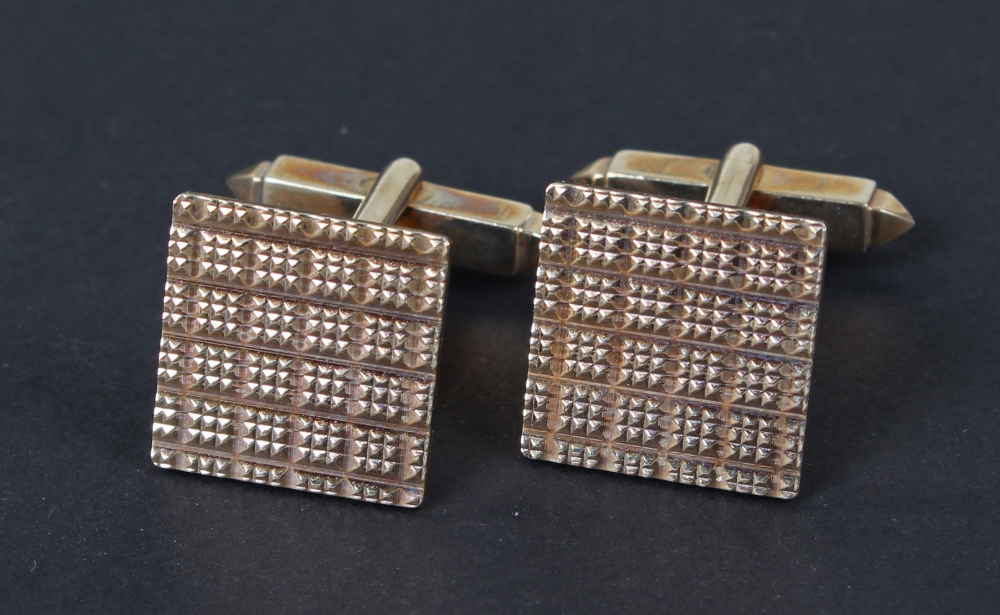 Pair of 9 carat gold cufflinks, each of square form, total weight 10.2 grams, (2)