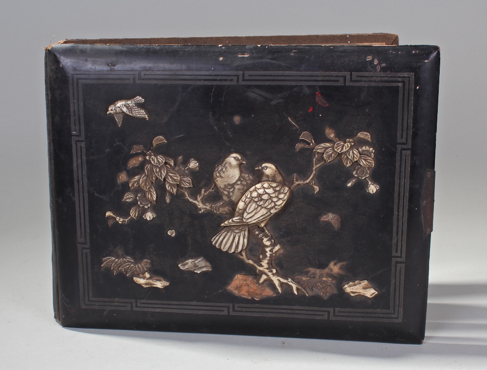 Late 19th Century Japanese black lacquered and ivory inlaid photograph album, the cover having