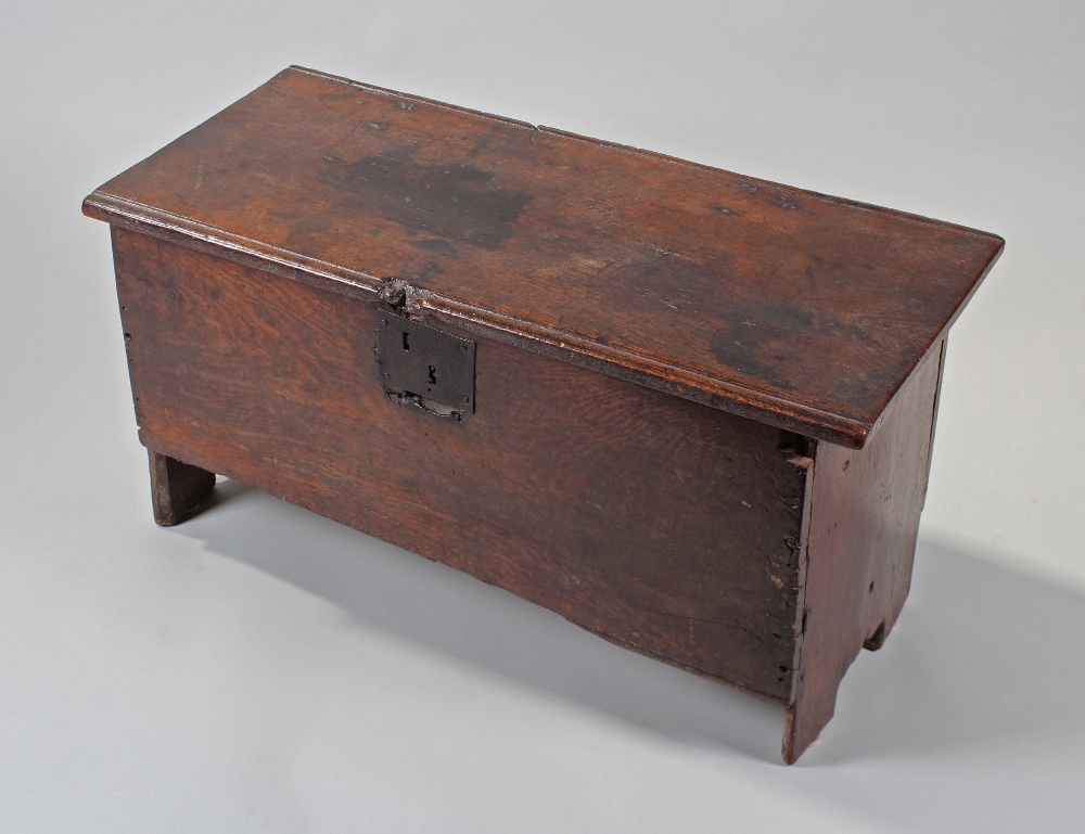 17th Century six plank oak coffer, with hinged lid and iron escutcheon, 80cm wide x 43cm high x 37cm
