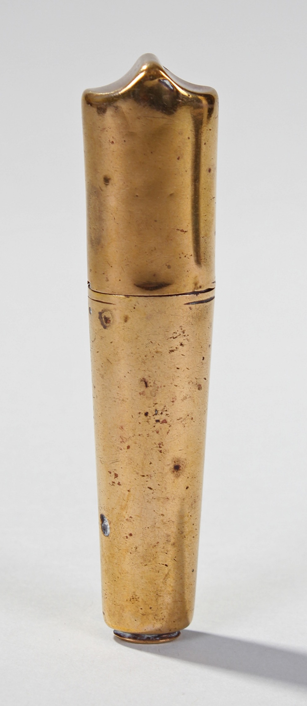 19th Century brass needle case, of tapering form, slide on lid, 10cm high