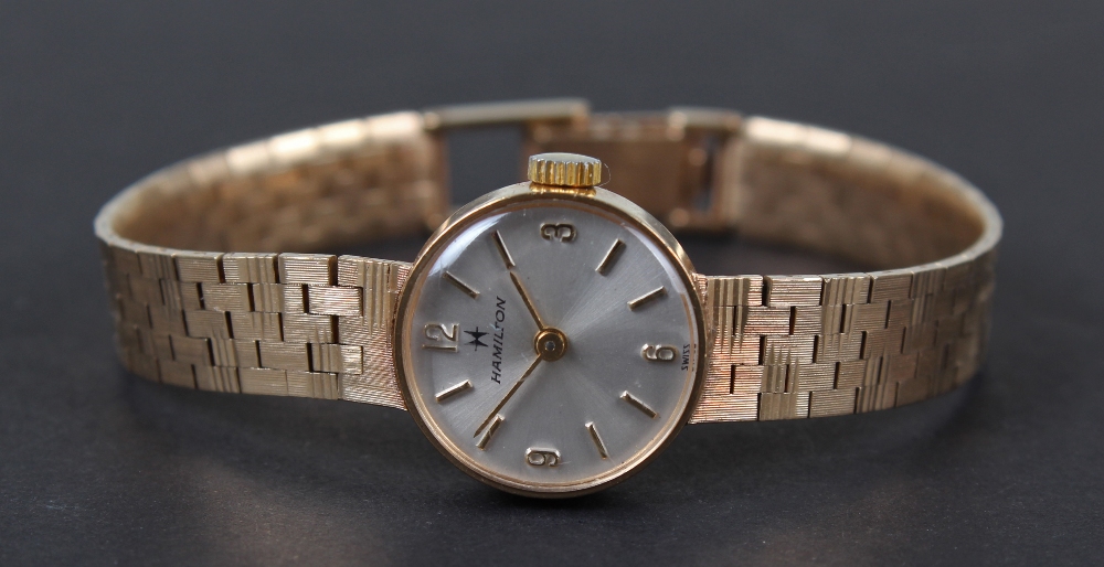 Hamilton 9 carat gold ladies wristwatch, the silvered dial having gilt arabic numerals and hour