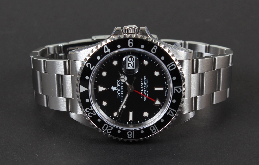 Rolex Oyster Perpetual Date GMT-Master gentleman`s stainless steel wristwatch, the black dial having