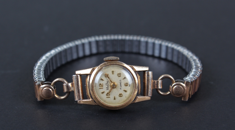 18 carat gold MuDu ladies wristwatch, the dial having gilt arabic numerals and hour batons, 14mm