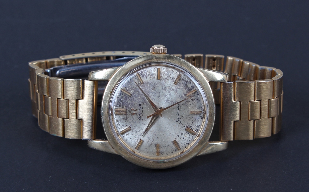 Omega Automatic Seamaster gold plated gentleman`s wristwatch, the silvered dial having gilt hour