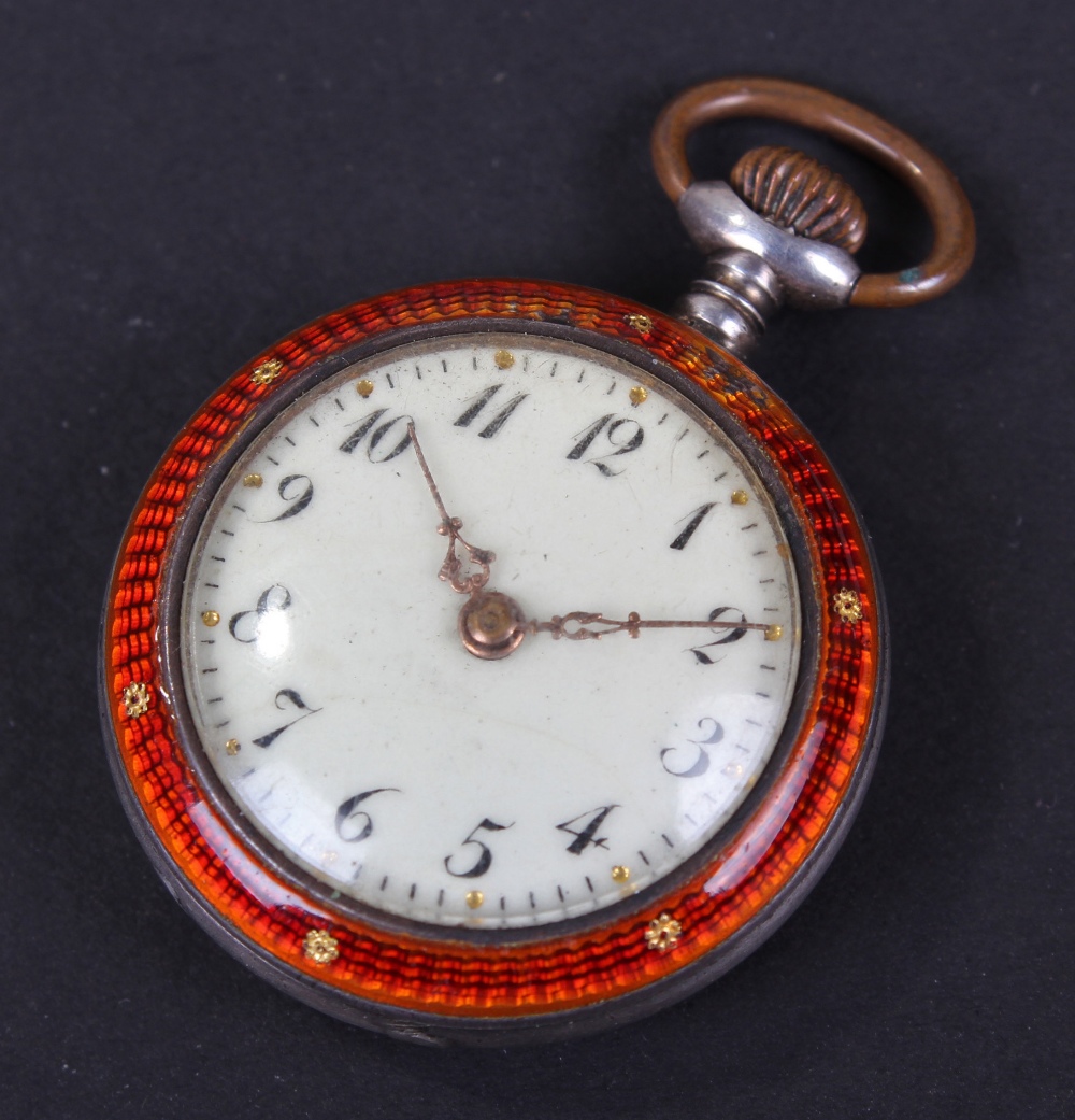 Early 20th Century ladies silver and enamelled pocket watch, with a red enamel case and town scene