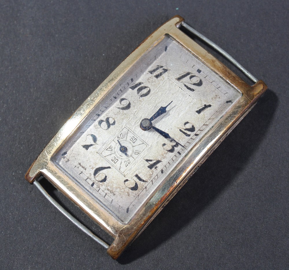 Gentleman`s art deco rolled gold cased wristwatch, the silvered dial having black arabic numerals,