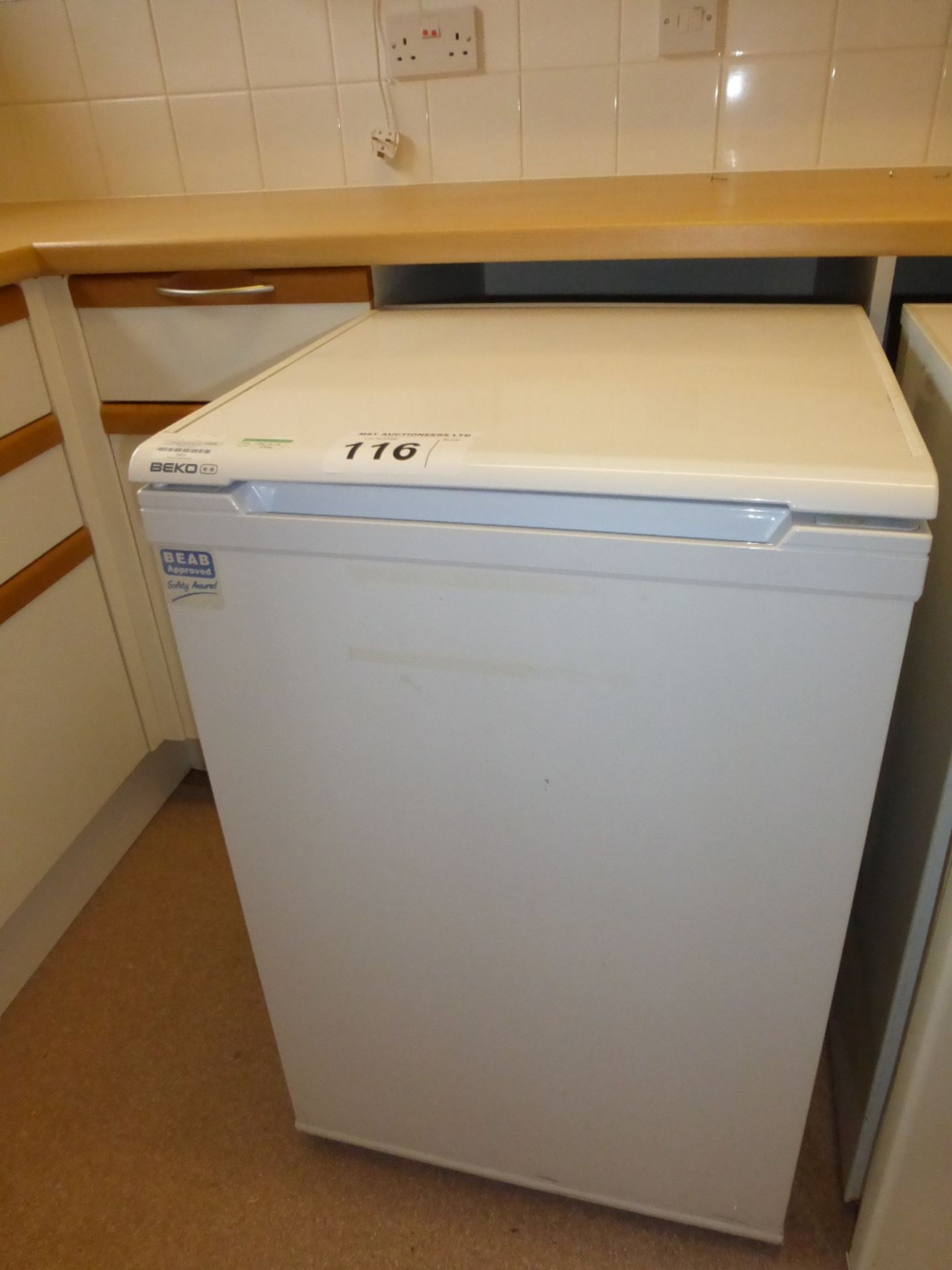 A Beko under counter refrigerator (located in room 40.
