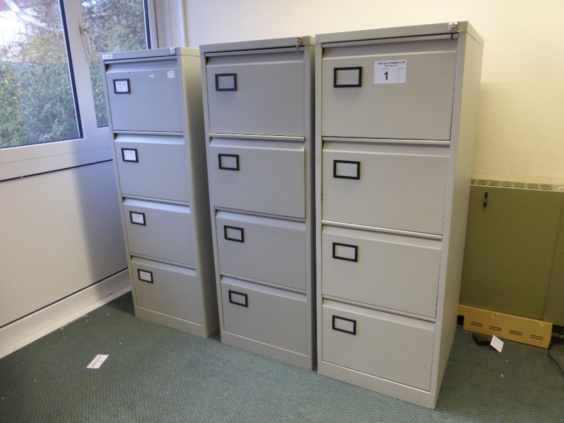 3 modern light grey metal 4 drawer filing cabinets (located in room 1)