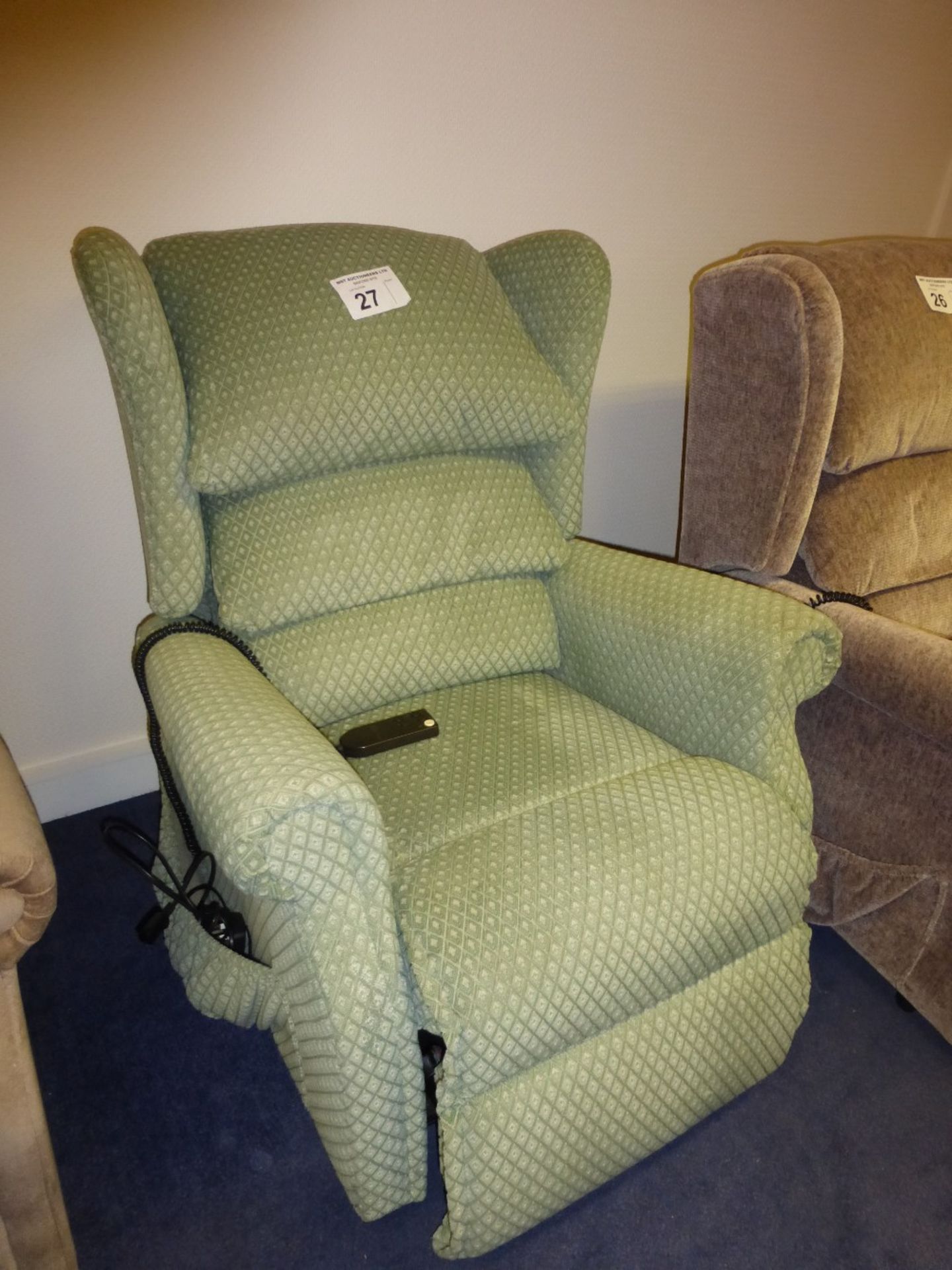 A Sherborne green upholstered electrically operated recliner chair (located in room 5)