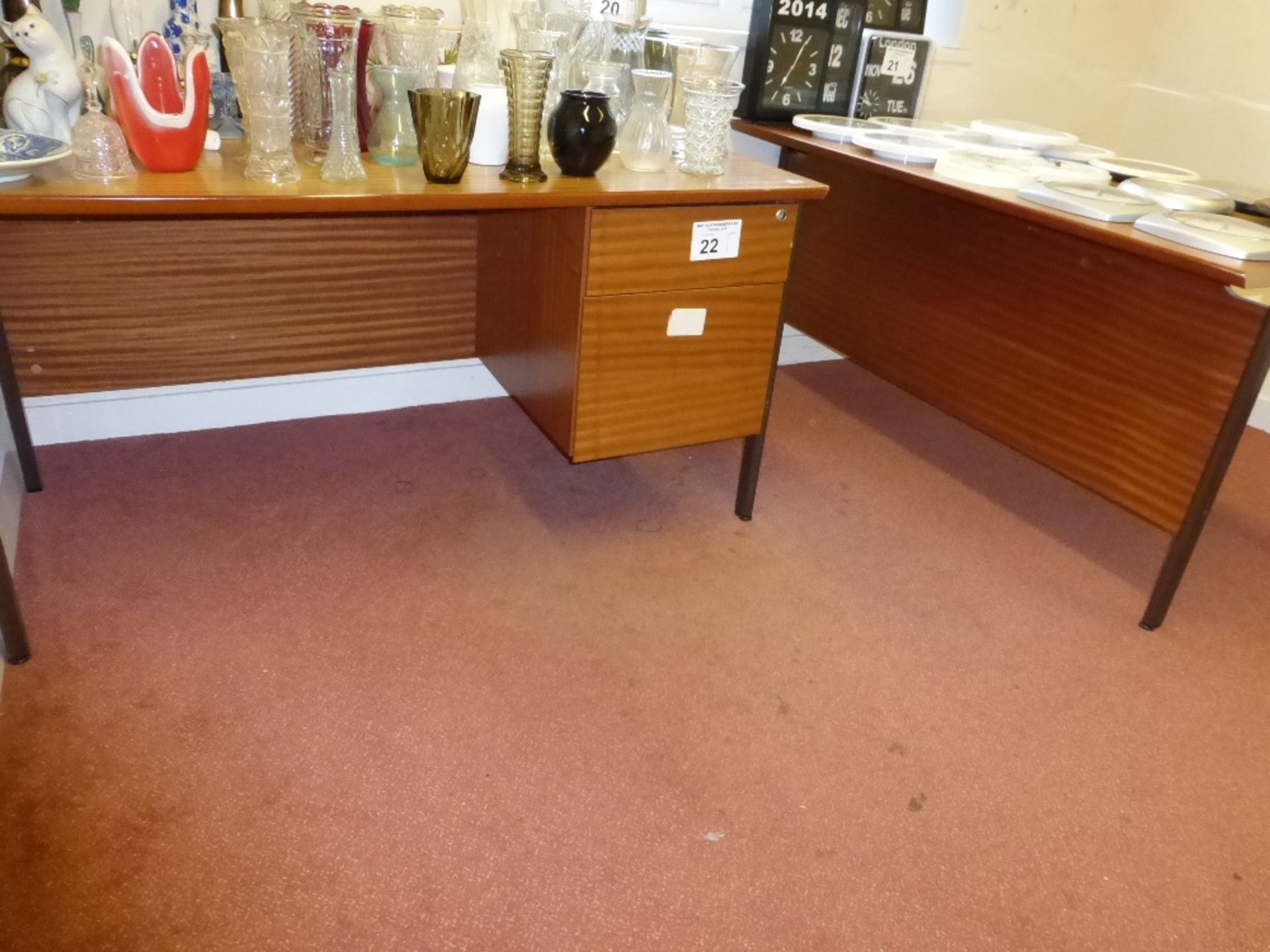 A hardwood office desk and similar office table (located in room 4)