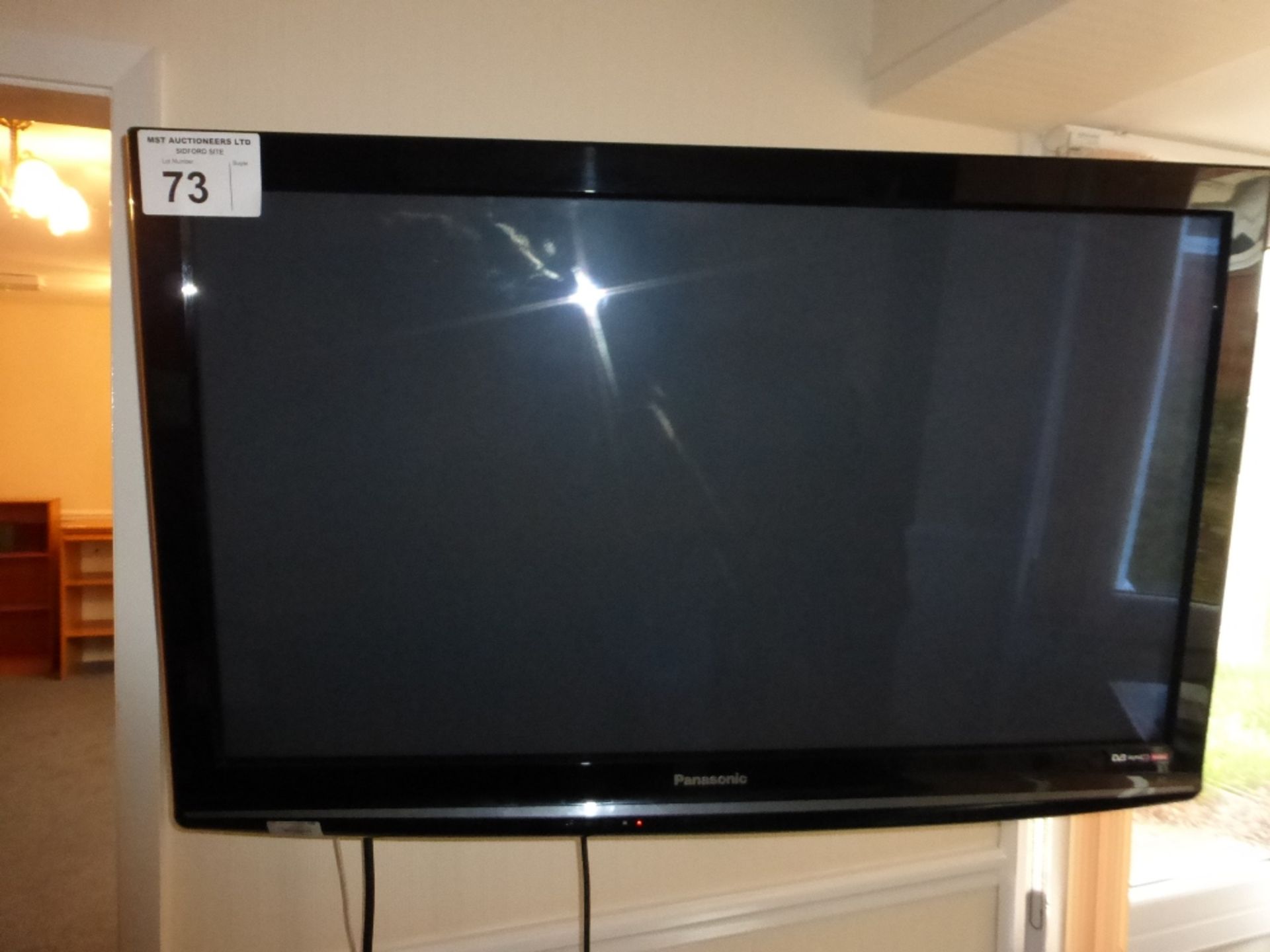 1 Panasonic 42 inch wall mounted LCD TV, Model number: TX-42PX10B, Serial number: FJ-9213410 (