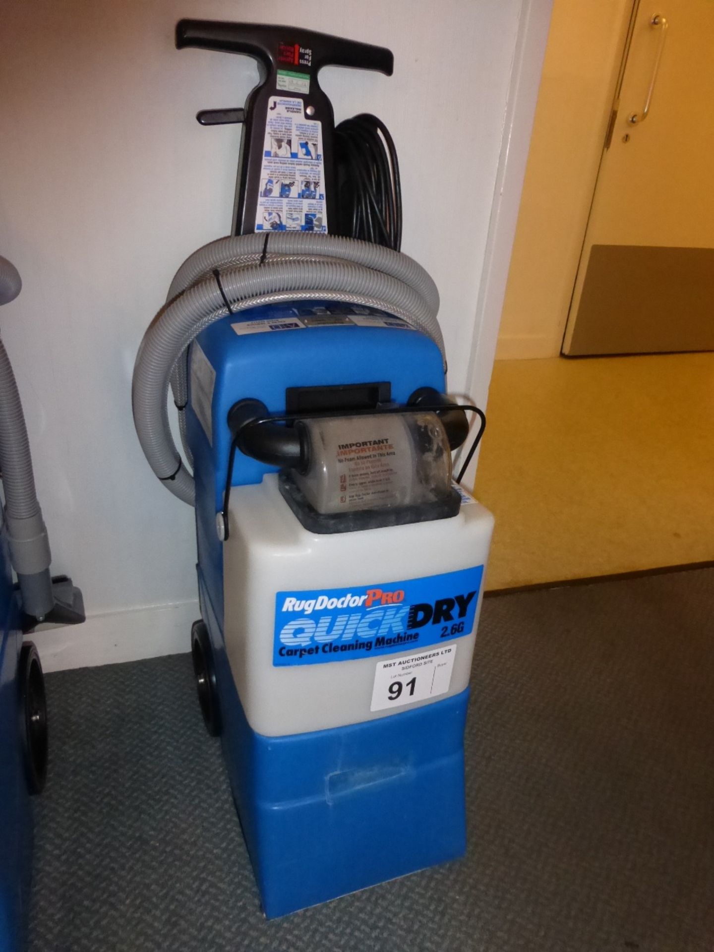 A RugDoctor Pro Quick Dry 2.6G carpet cleaning machine (located in room 31)