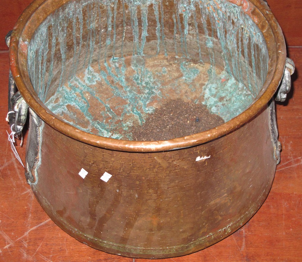 Large Eastern two handled copper cauldron or jar.
