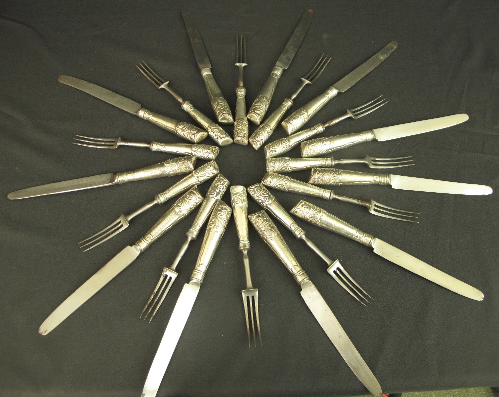 A TWELVE PIECE SET OF 18TH CENTURY KNIVES AND FORKS, steel three pronged forks and knives with