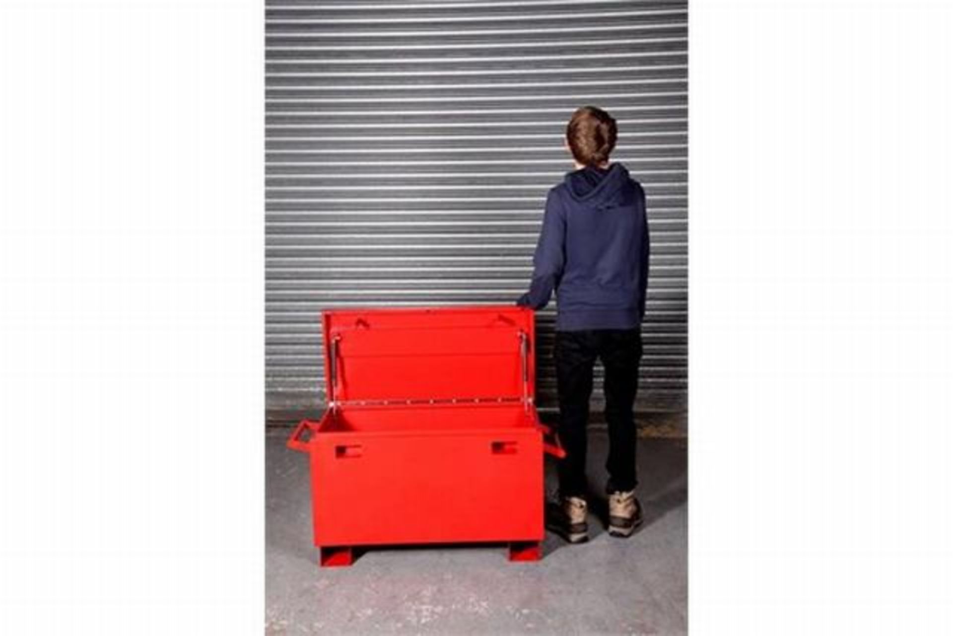 Mild steel vehicle / workshop toolbox powder coated red the unit is fitted with twin gas struts on