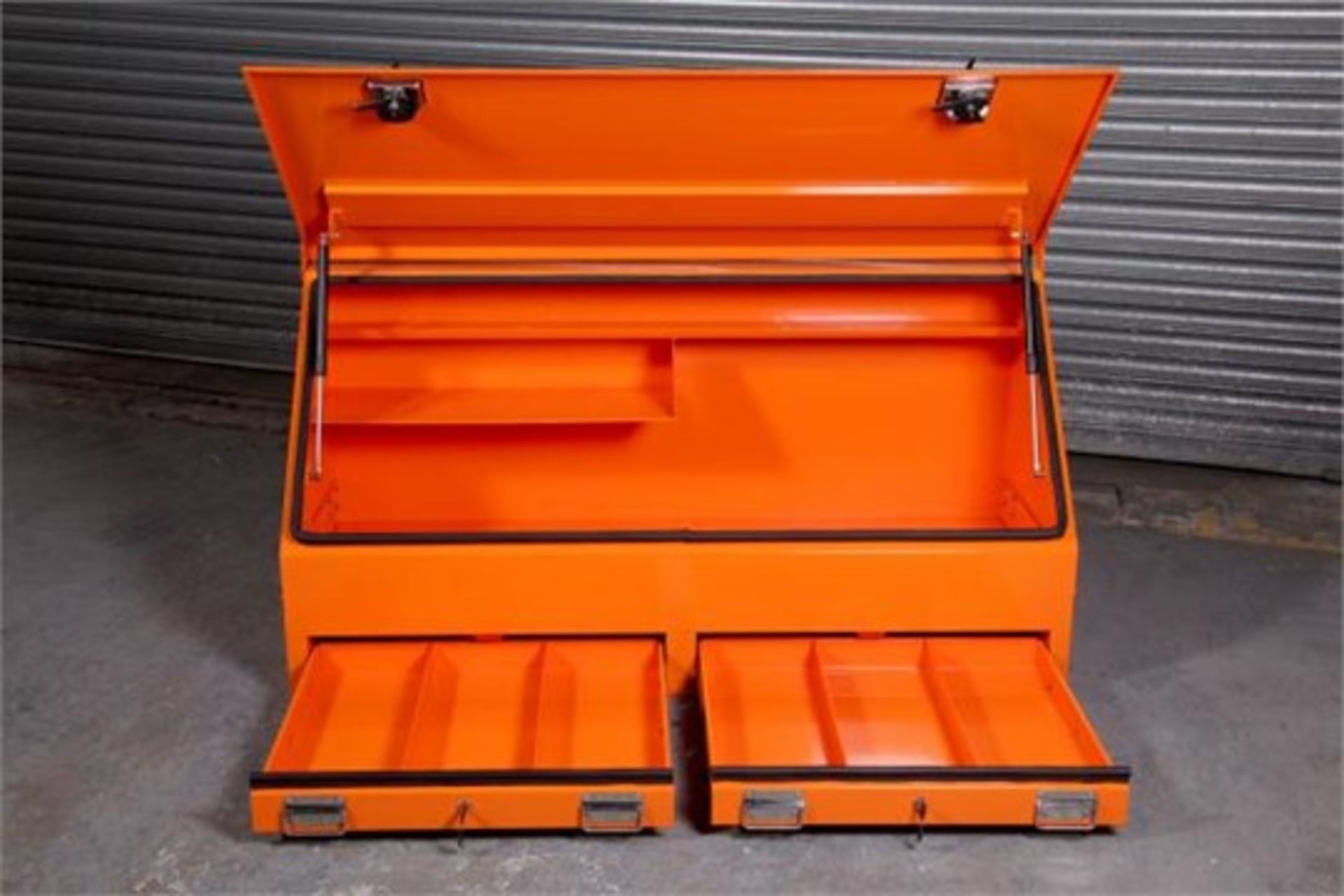 Mild steel vehicle toolbox powder coated orange the unit is fitted with twin gas struts on the lid