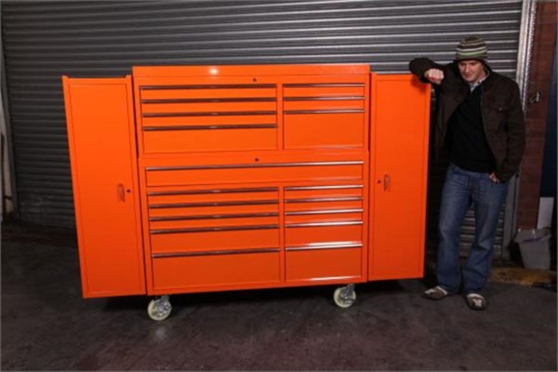 Mild steel powder coated orange toolbox has tool chest, side locker, ball bearing sliding drawers