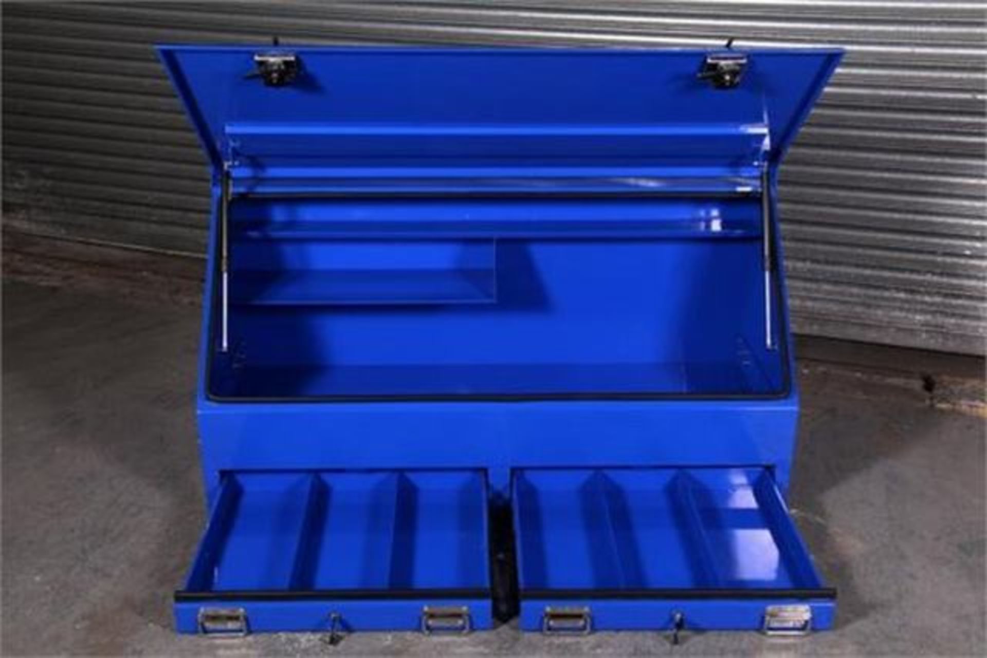 Mild steel vehicle toolbox powder coated blue the unit is fitted with twin gas struts on the lid and