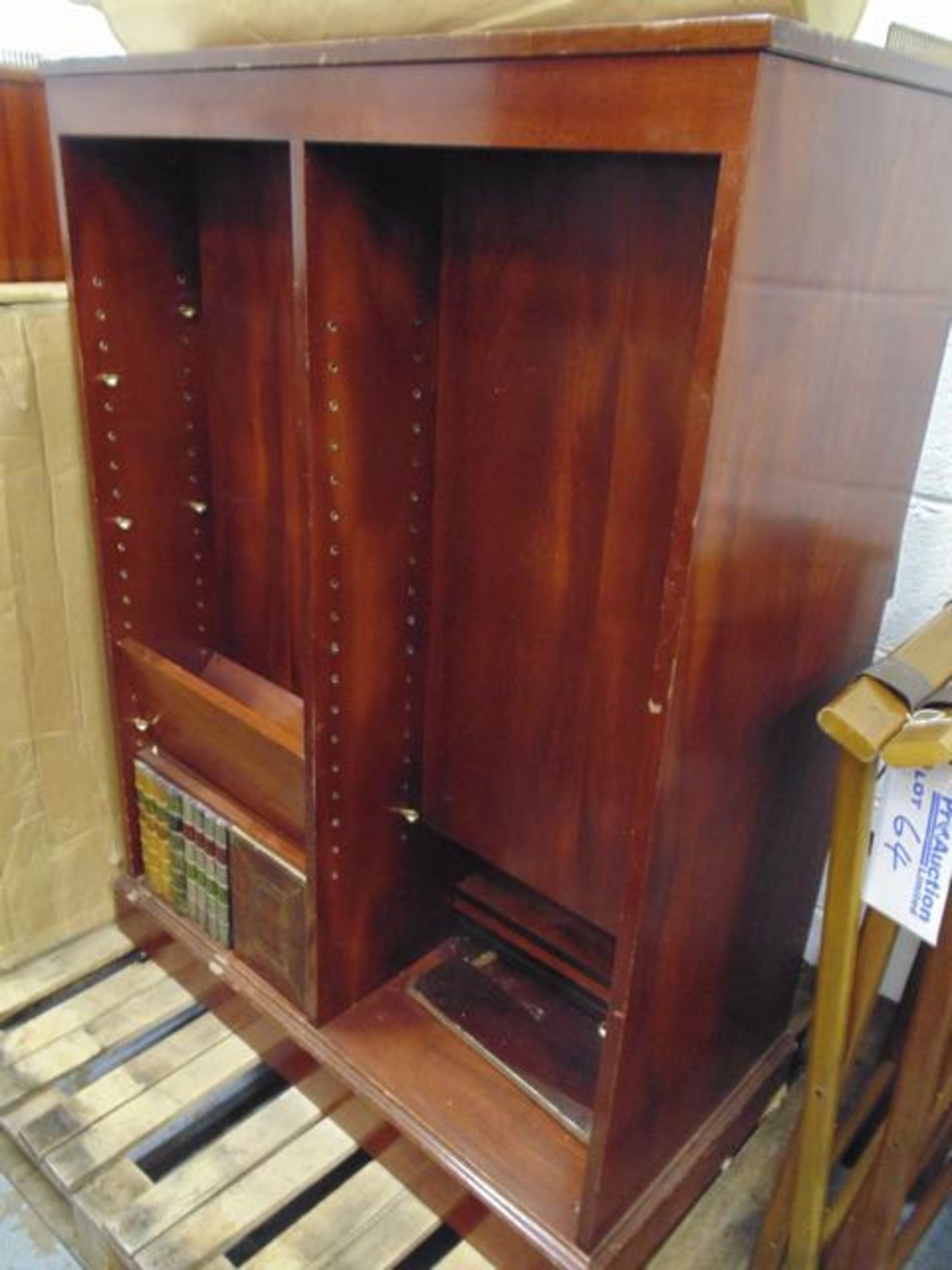A mahogany bookcase with  integral pop up TV lift., electric TV lift includes a Samsung 26' TV