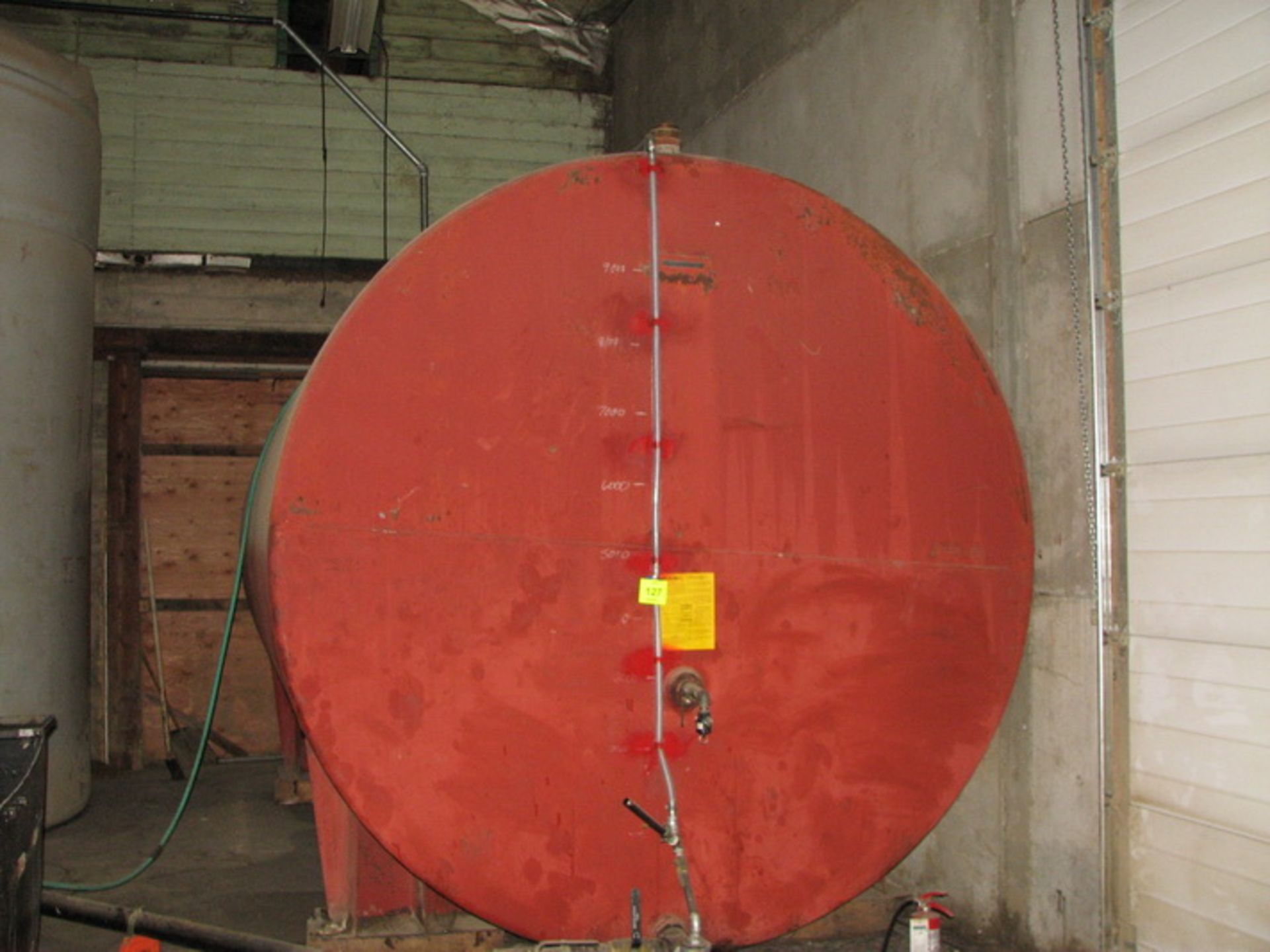 10,000 Gallon capacity mild steel horizontal tank, 8'10" dia. x 18' L