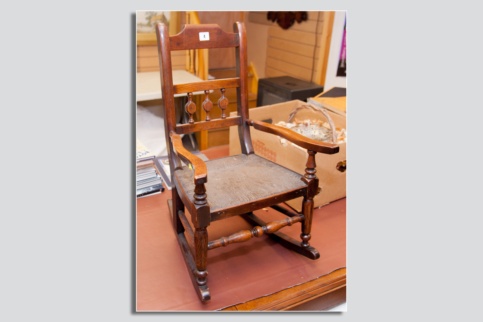 A delightful and well coloured oak and rush seated child`s chair of typical 19th Century farmhouse