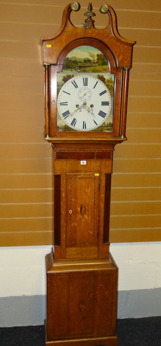 An early nineteenth century marquetry decorated oak and mahogany eight-day longcase clock, the
