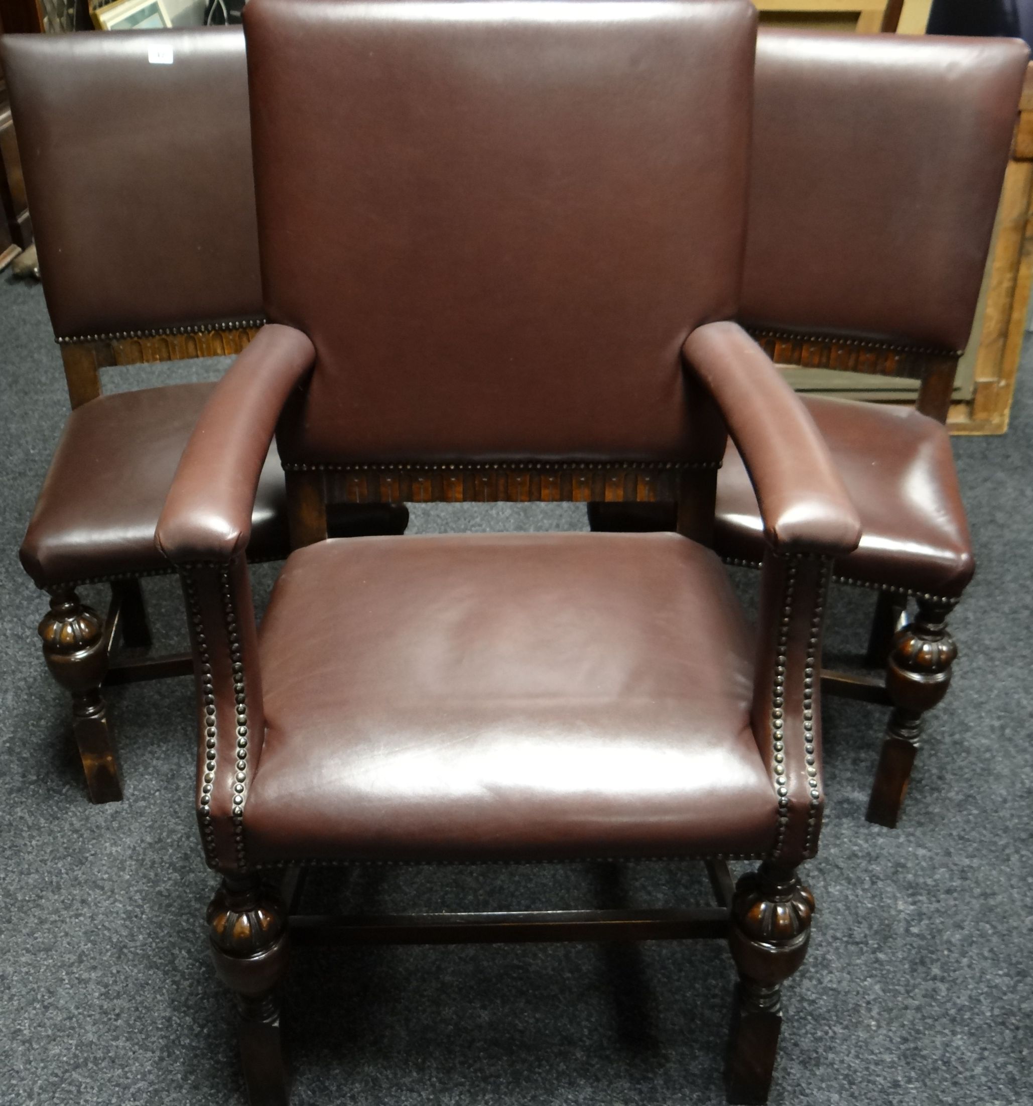 A set of 4 + 2 buttoned leather drawing room chairs