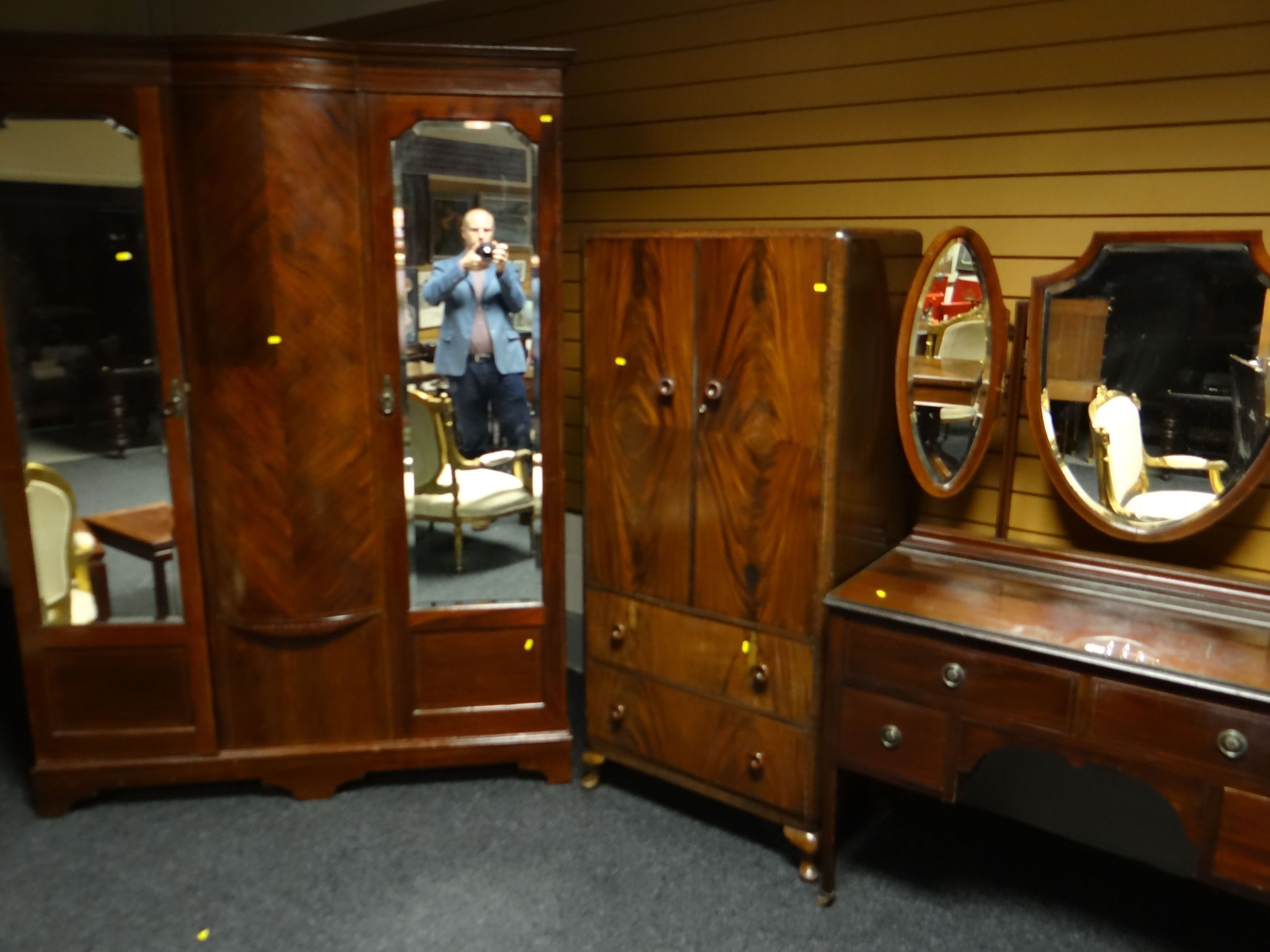 An Edwardian inlaid mahogany wardrobe and press cupboard, having a pair of full length mirrored