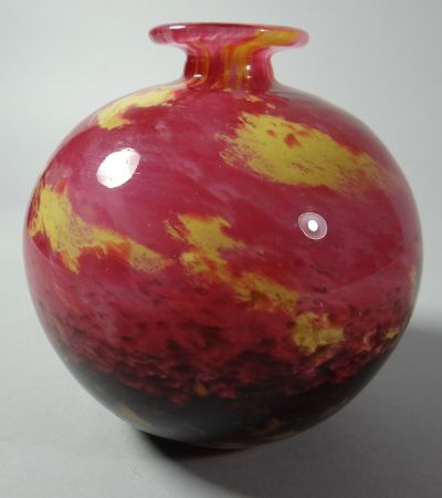 A Charles Schneider globular French art glass vase, in mottled and cloudy orange, purple and yellow,